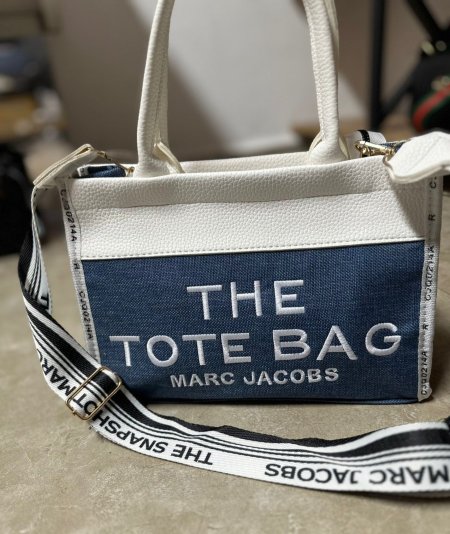 THE TOTE BAG <br> <span class='text-color-warm'>سيتوفر قريباً</span>