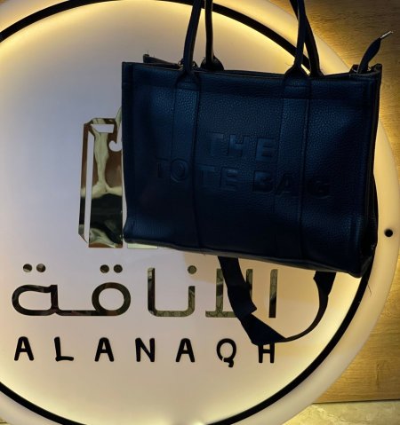 THE TOTE BAG <br> <span class='text-color-warm'>سيتوفر قريباً</span>