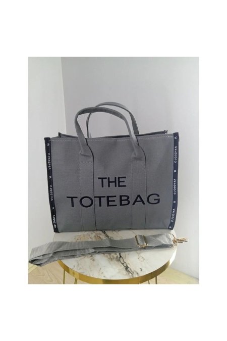 THE TOTE BAG <br> <span class='text-color-warm'>سيتوفر قريباً</span>