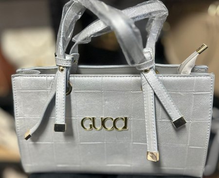 GUCCI <br> <span class='text-color-warm'>سيتوفر قريباً</span>