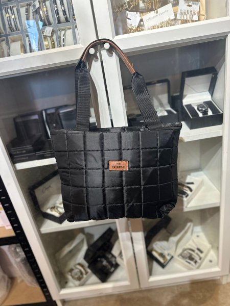 The tote bag حجم وسط <br> <span class='text-color-warm'>سيتوفر قريباً</span>