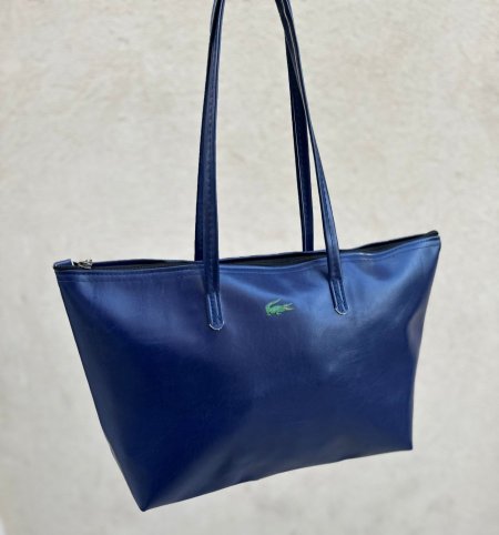 لاكوست جلد كحلي