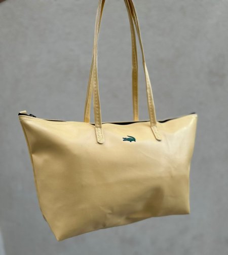 لاكوست جلد اصفر