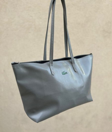 لاكوست جلد رمادي