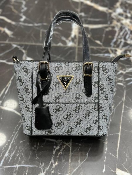 GUESS وسط <br> <span class='text-color-warm'>سيتوفر قريباً</span>